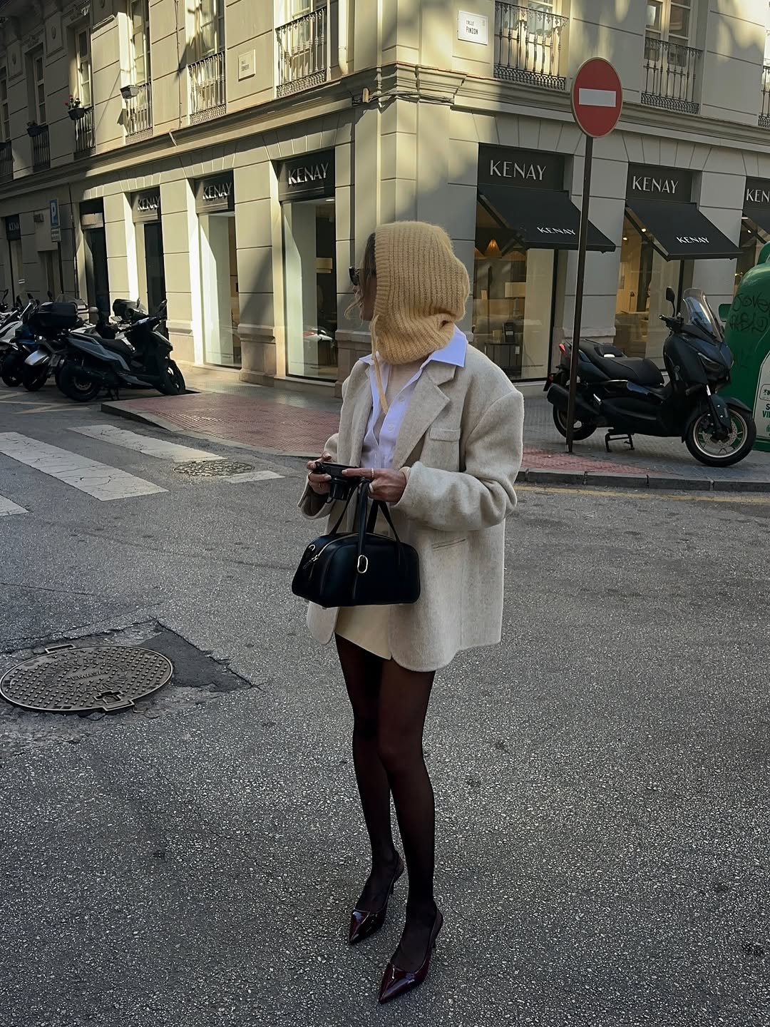 woman wearing black patent leather heels trend