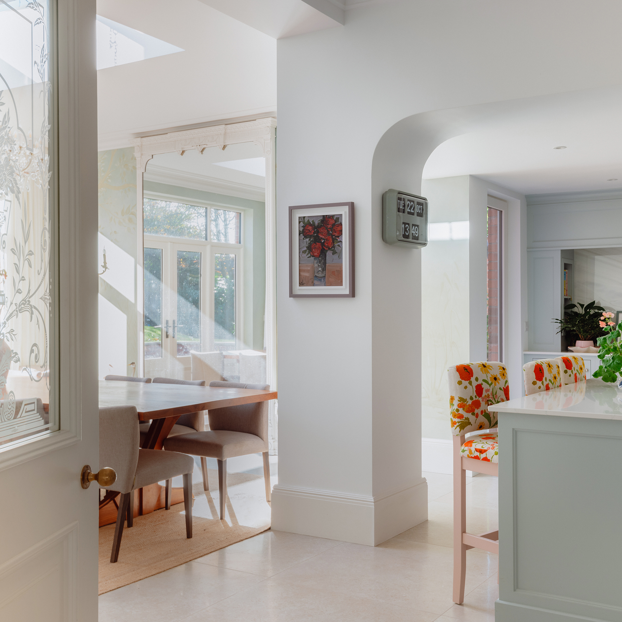 open plan kitchen diner with patio doors and roof light
