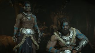 Two barbarians posing next to each other, one is standing, the other is crouched