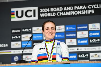 Picture by Ed Sykes/SWpix.com - 22/09/2024 - 2024 UCI Road and Para-cycling Road World Championships, Zurich, Switzerland - Womenâ€™s Elite Individual Time Trial (ITT) Press Conference - Grace Brown (Australia) on the podium receiving the Gold Medal and becoming World Champions