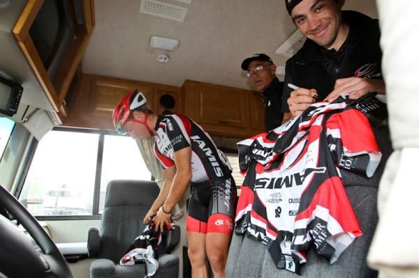 The Jamis-Sutter Home guys sign giveaway jerseys and get ready for the last stage.