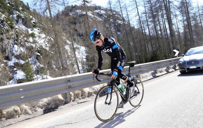 Bradley Wiggins gets out of the saddle.