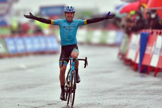 Team Astana rider Spains Ion Izagirre celebrates as he crosses the finishline of the 6th stage of the 2020 La Vuelta cycling tour of Spain a 1464 km race from Biescas to Formigal on October 25 2020 Photo by ANDER GILLENEA AFP Photo by ANDER GILLENEAAFP via Getty Images