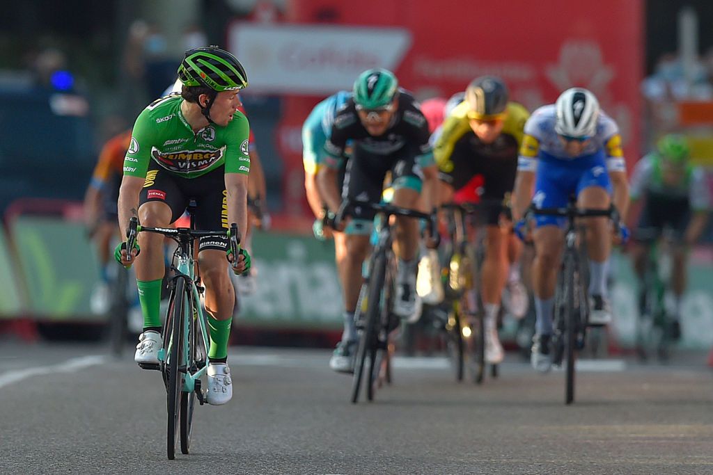 Team Jumbos Slovenian rider Primoz Roglic checks cyclists behind him before crossing the finishline of the 10th stage of the 2020 La Vuelta cycling tour of Spain a 185km race from Castro Urdiales to Suances on October 30 2020 Photo by ANDER GILLENEA AFP Photo by ANDER GILLENEAAFP via Getty Images