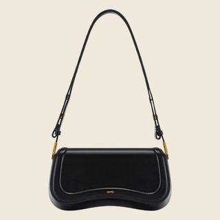 flat lay of small black handbag