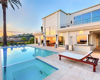 exterior of luxury house with swimming pool