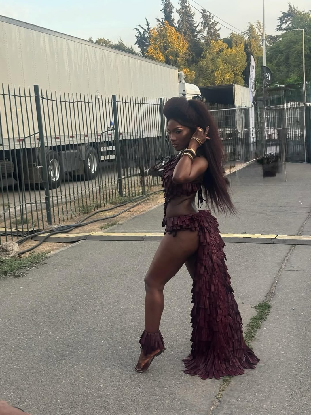 Doechii wore a ruffled Cult Gaia look to perform at Lollapalooza last week