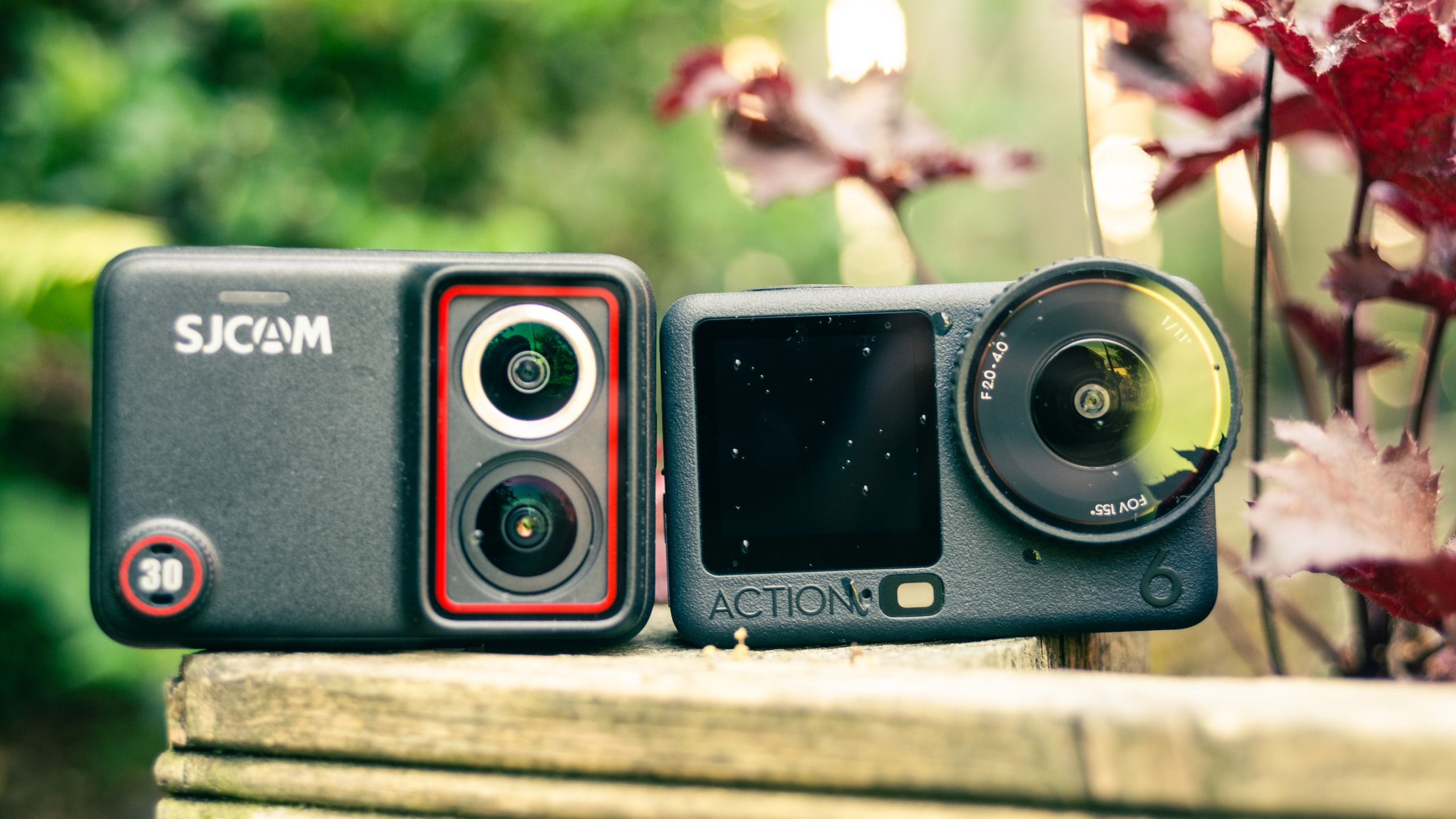 The SJCAM SJ30 next to the DJI Osmo Action 6 action cameras