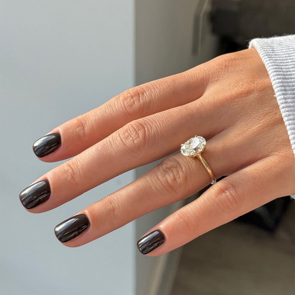 A deep brown manicure by Julia Diogo