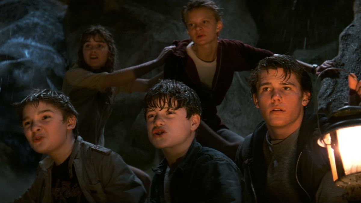 The kids looking worried inside the cave, The Goonies.