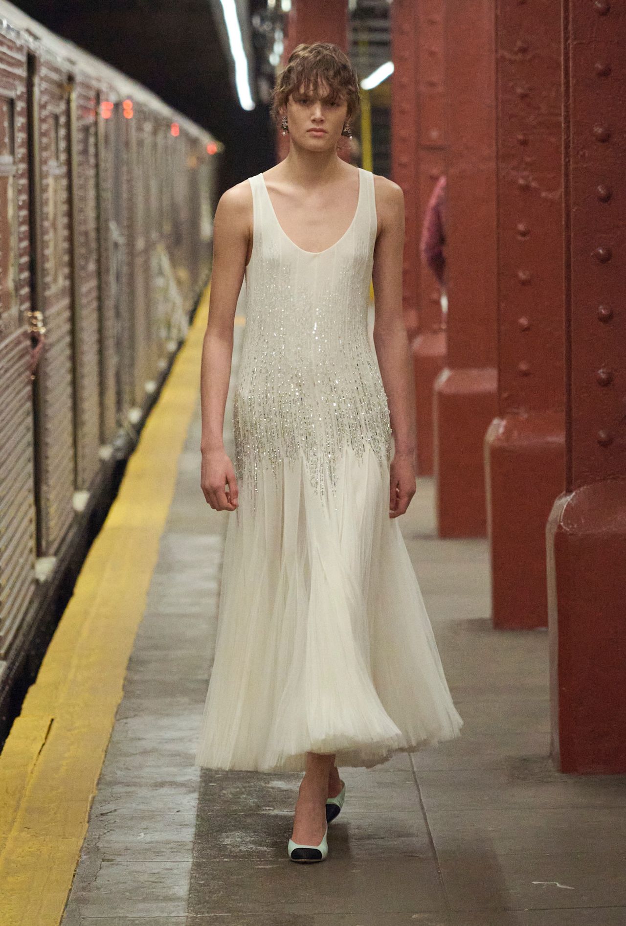 models walk the subway runway for the chanel metiers d'art 2026 show in new york city