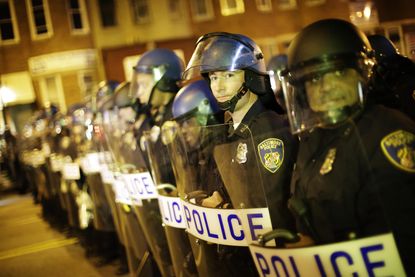 Police in Baltimore hold the line.