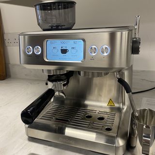 Testing ProCook's new stainless steel bean to cup coffee machine on a marble countertop