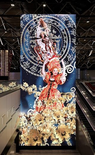 The huge totem display in the airport exudes culture to all visitors by featuring a range of Russian artists.
