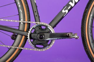 Specialized S-Works Crux section shown in the image is the Sram Red power meter chainset and cranksbetween the wheels