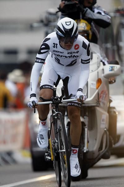 Defending Tour de France champion Carlos Sastre tried to limit his losses in the opening time trial.