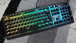 The Roccat Pyro pictured on a desktop with RGB lighting enabled