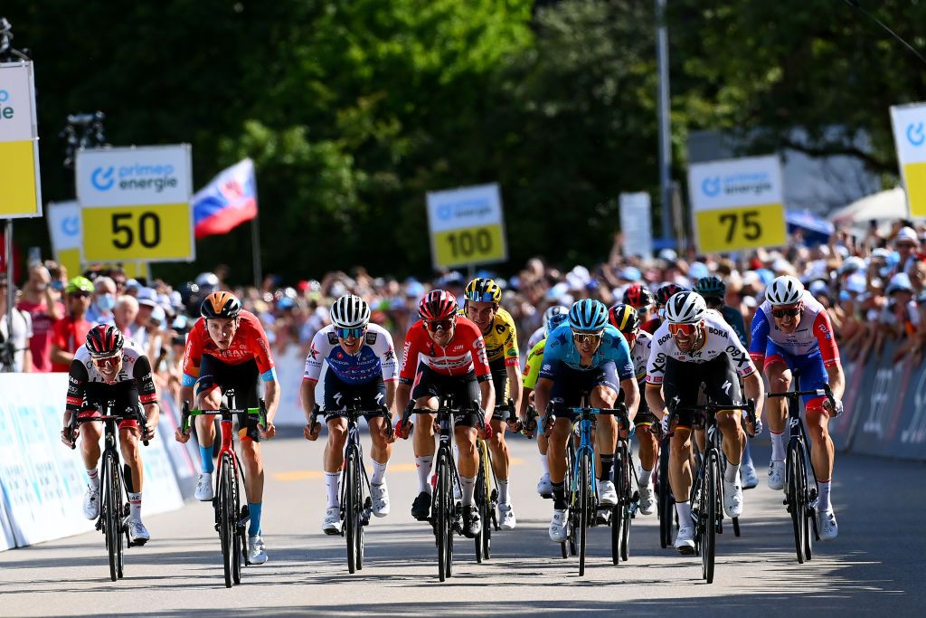 KUSNACHT SWITZERLAND JUNE 12 LR Marc Hirschi of Switzerland and UAE Team Emirates Stephen Williams of United Kingdom and Team Bahrain Victorious Ilan Van Wilder of Belgium and Team QuickStep Alpha Vinyl Andreas Lorentz Kron of Denmark and Team Lotto Soudal Alexey Lutsenko of Kazahkstan and Team Astana Qazaqstan Maximilian Schachmann of Germany and Team Bora Hansgrohe and Stefan Kng of Switzerland and Team Groupama FDJ sprint to win during the 85th Tour de Suisse 2022 Stage 1 a 1776km stage from Kusnacht to Kusnacht 679m ourdesuisse2022 WorldTour on June 12 2022 in Kusnacht Switzerland Photo by Tim de WaeleGetty Images
