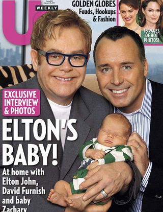 Elton John and David Furnish - Elton John and baby picture covered with