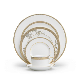 Vera Wang set of dinner plates with gold edging