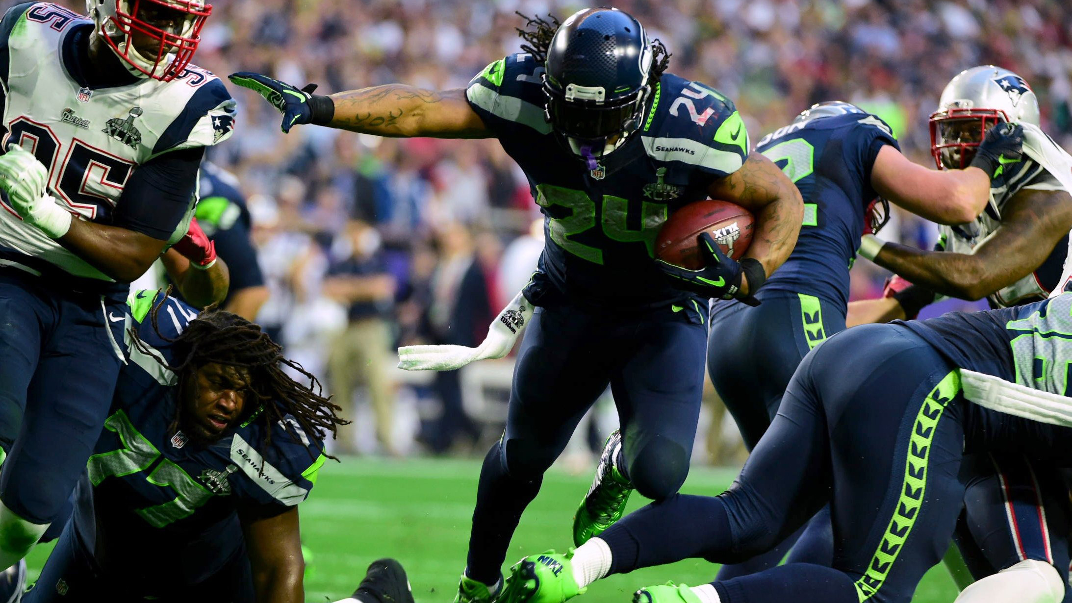 Football: Super Bowl XLIX: Seattle Seahawks Marshawn Lynch (24) in action, scoring touchdown vs New England Patriots during 2nd quarter at University of Phoenix Stadium. 
Glendale, AZ 2/1/2015
CREDIT: John Biever (Photo by John Biever /Sports Illustrated via Getty Images)
(Set Number: X159217 TK1 )