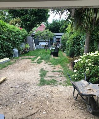 shot of a garden before a makeover with damaged lawn