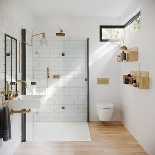 modern white bathroom with walk in shower and high level window