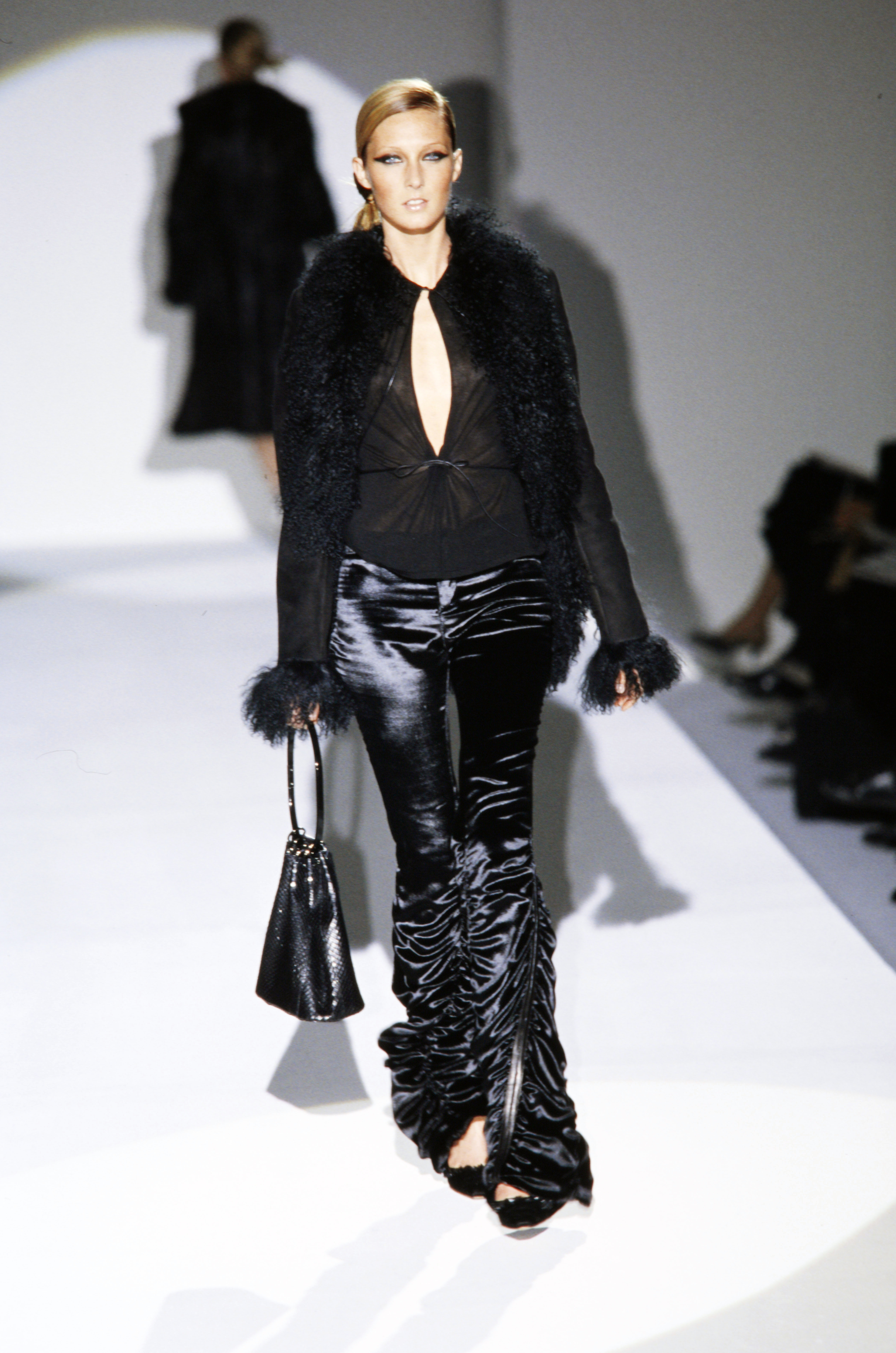 A model carried Rihanna&#039;s bag in the Gucci Fall 1999 runway show