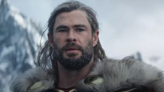 Chris Hemsworth looking concerned in cold weather in Thor: Love and Thunder.