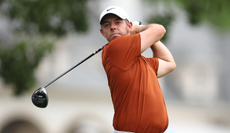 Rory McIlroy hits a driver off the tee