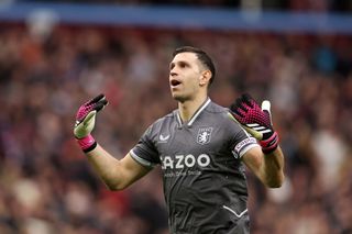 Emiliano Martinez of Aston Villa celebrates their sides second goal during the Premier League match between Aston Villa and Leicester City at Villa Park on February 04, 2023 in Birmingham, England.