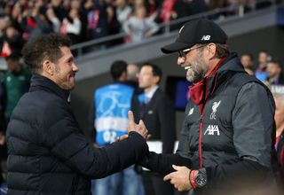 Atletico Madrid manager Diego Simeone shakes hands with Liverpool counterpart Jurgen Klopp