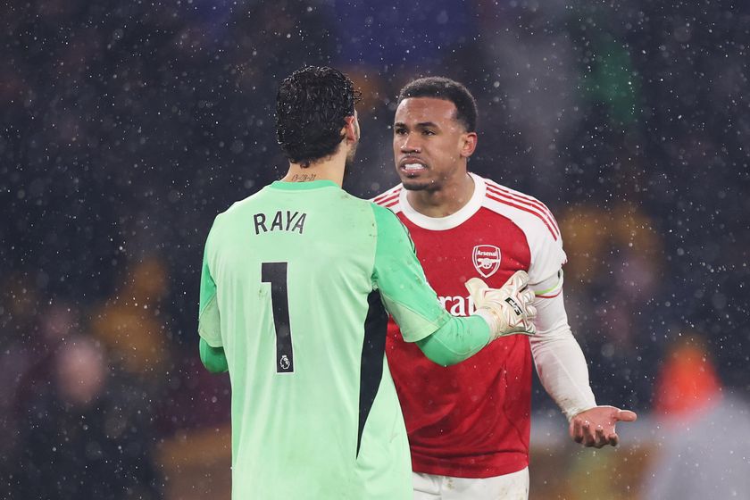 David Raya and Gabriel of Arsenal clash after Tom Edozie of Wolverhampton Wanderers (not pictured) scores his team's second goal during the Premier League match between Wolverhampton Wanderers and Arsenal at Molineux on February 18, 2026 in Wolverhampton, England.