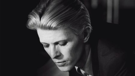 a portrait of David Bowie in black and white shot by Geoff MacCormack who will be one of the speakers at the event