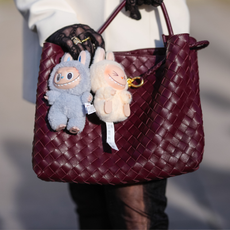 Labubu bag charm on Bottega bag