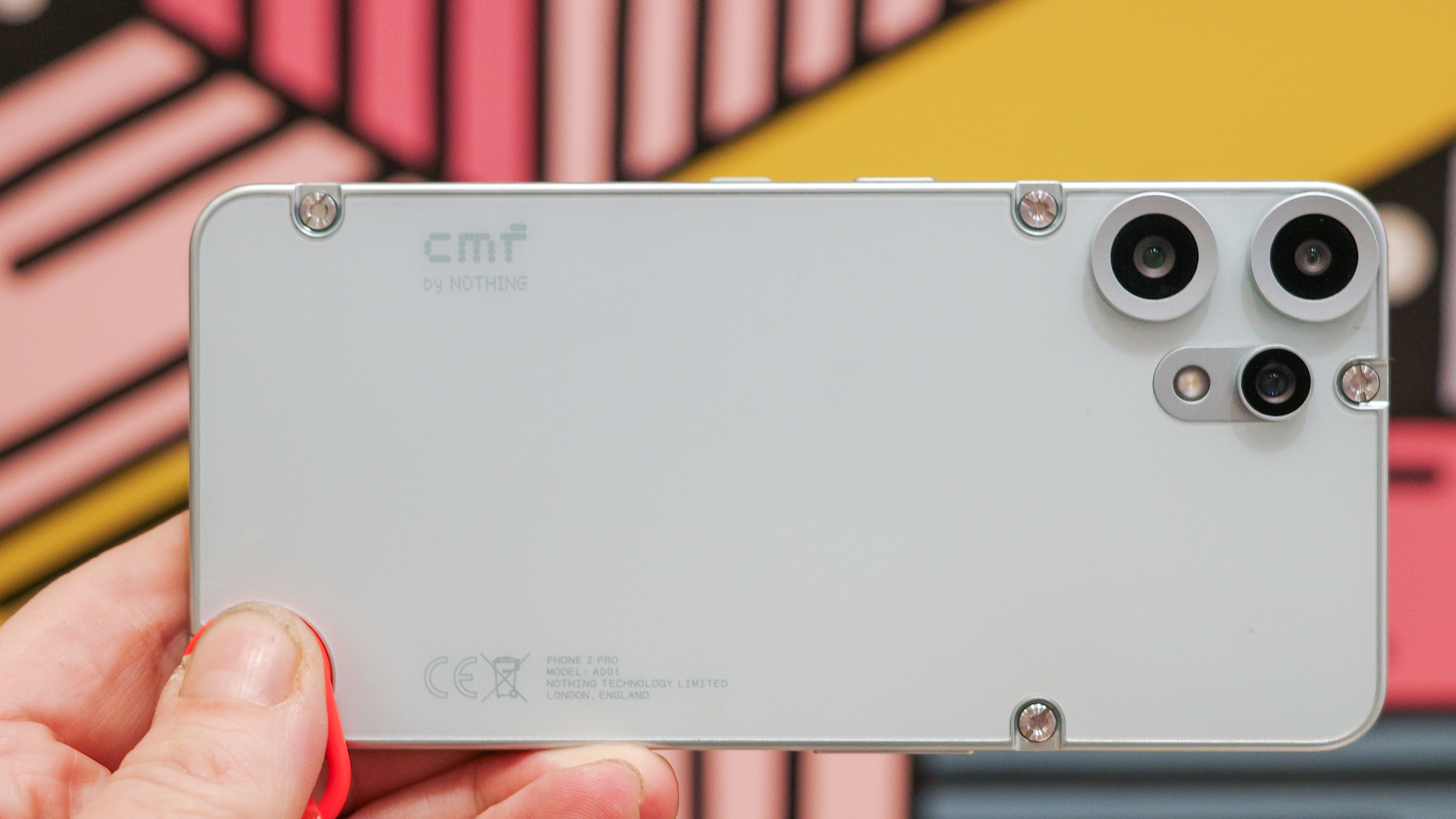 CMF Phone 2 Pro in light green showing back with exposed screws and cameras
