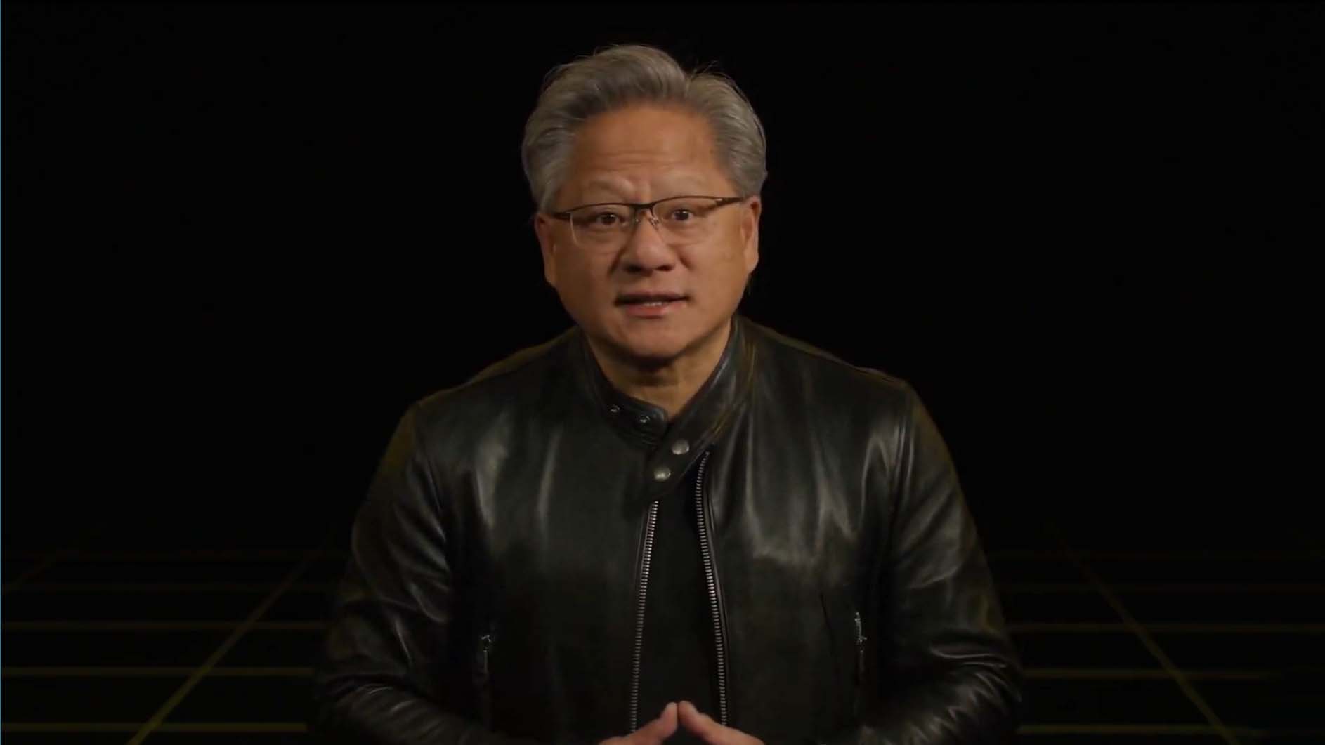 Nvidia CEO Jensen Huang against a black background