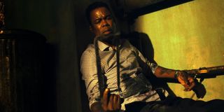 Chris Rock with the saw in Spiral