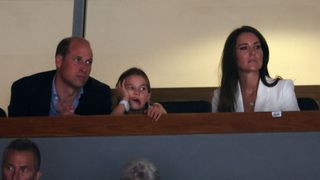 (L-R) Prince William, Duke of Cambridge, Princess Charlotte of Cambridge and Catherine, Duchess of Cambridge look on ahead of Men's Horizontal Bar Final and Women's Floor Exercise Final on day five of the Birmingham 2022 Commonwealth Games at Arena Birmingham on August 02, 2022 on the Birmingham, England.
