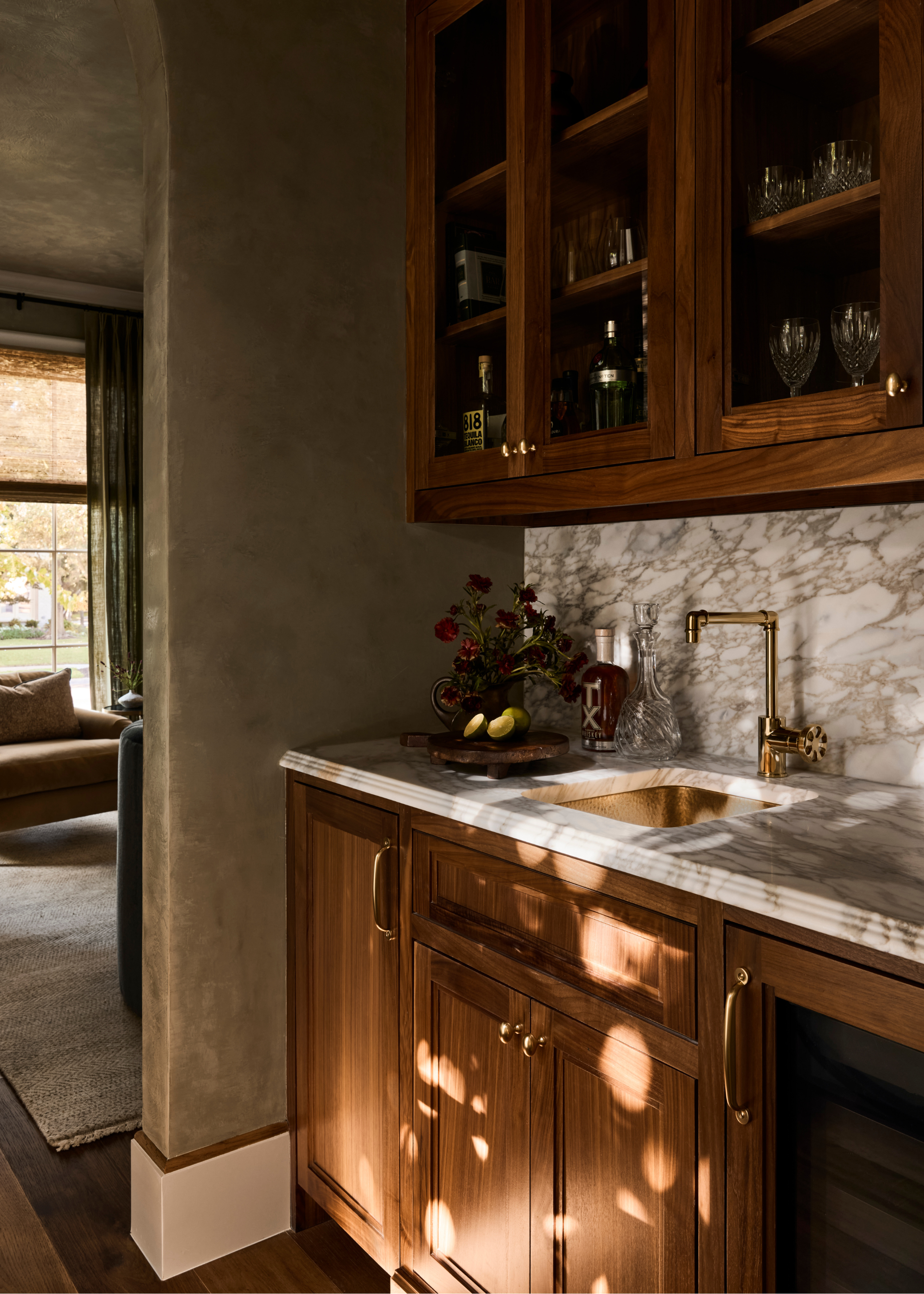 beautiful marble topped wooden cabinets in a small