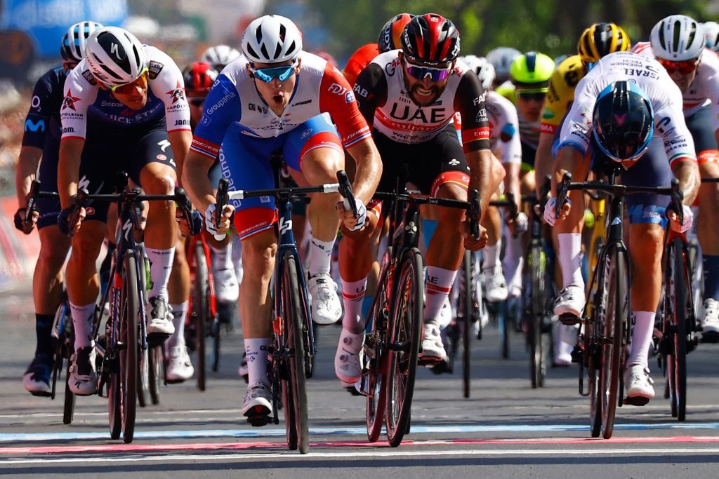 Team GroupamaFDJs French rider Arnaud Demare 2ndL crosses the finish line to win the 4th stage of the Giro dItalia 2022 cycling race 174 kilometers between Catania and Messina Sicily on May 11 2022 Photo by Luca Bettini AFP Photo by LUCA BETTINIAFP via Getty Images