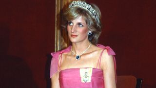 BRISBANE, AUSTRALIA - APRIL 11: Diana, Princess of Wales, wearing a pink dress designed by Victor Edelstein, the Spencer tiara and the Royal family order of the Queen and Saudi Arabia sapphire and diamond necklace and earrings, attends a state reception at the Crest International Hotel on April 11, 1983 in Brisbane, Australia.