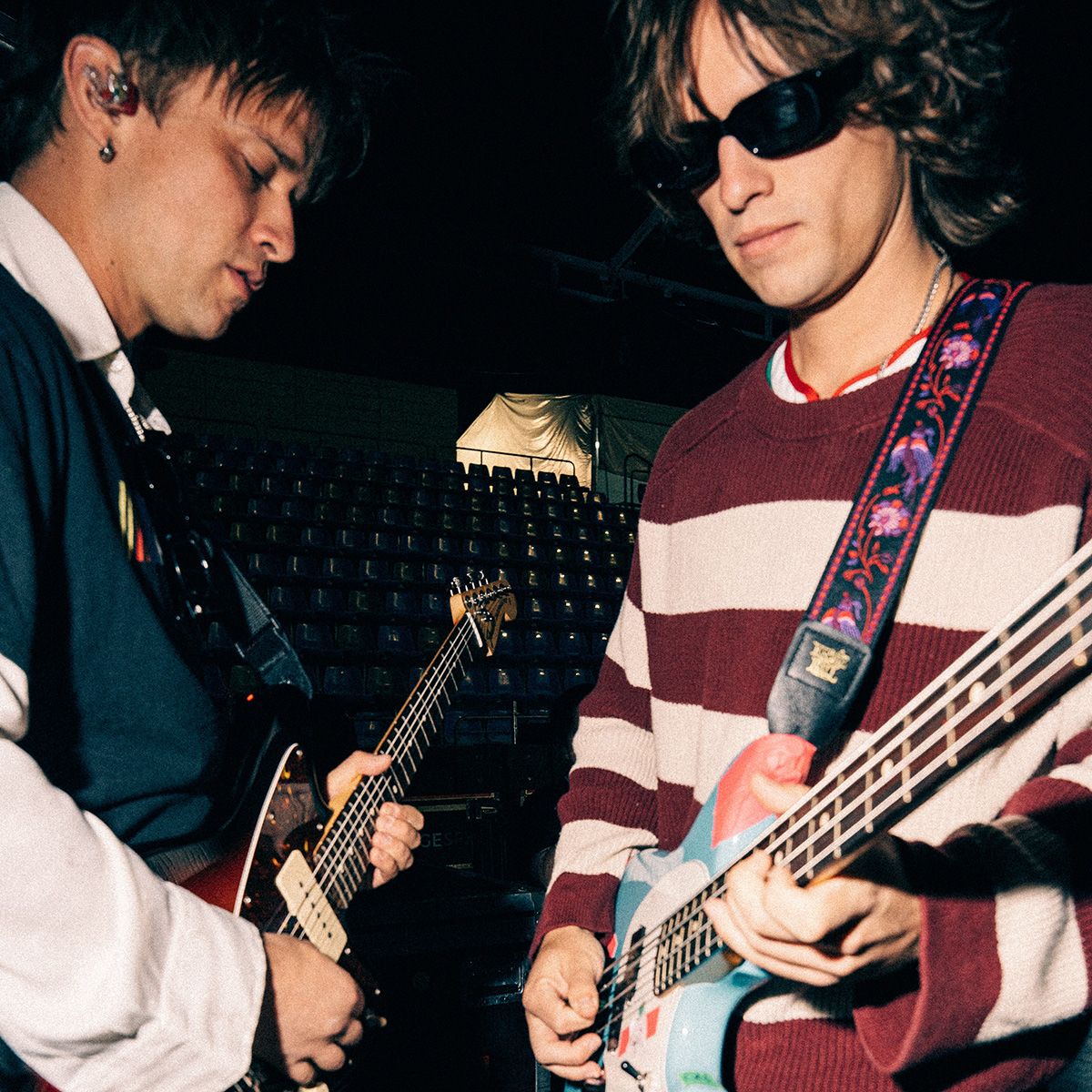 Balu Brigada duo playing a guitar and bass