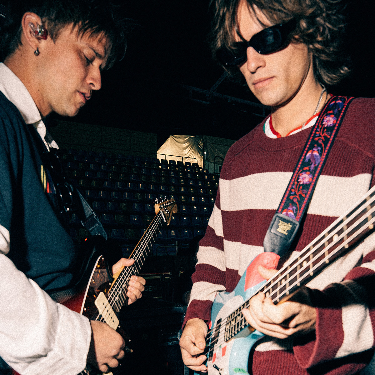 Balu Brigada duo playing a guitar and bass