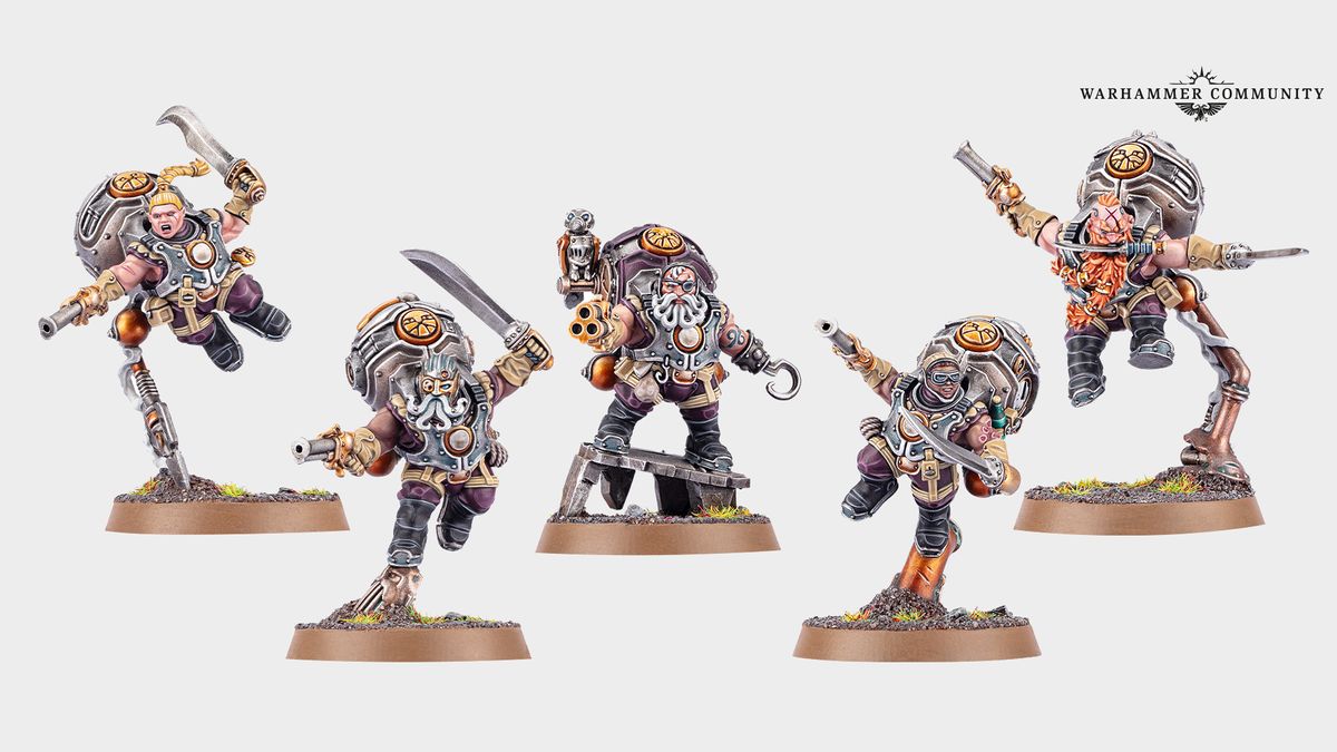 Kharadron Overlords models arranged in a line, with a Warhammer Community logo in the top right-hand corner