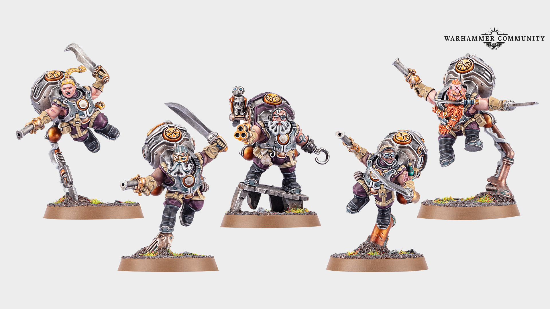 Kharadron Overlords models arranged in a line, with a Warhammer Community logo in the top right-hand corner