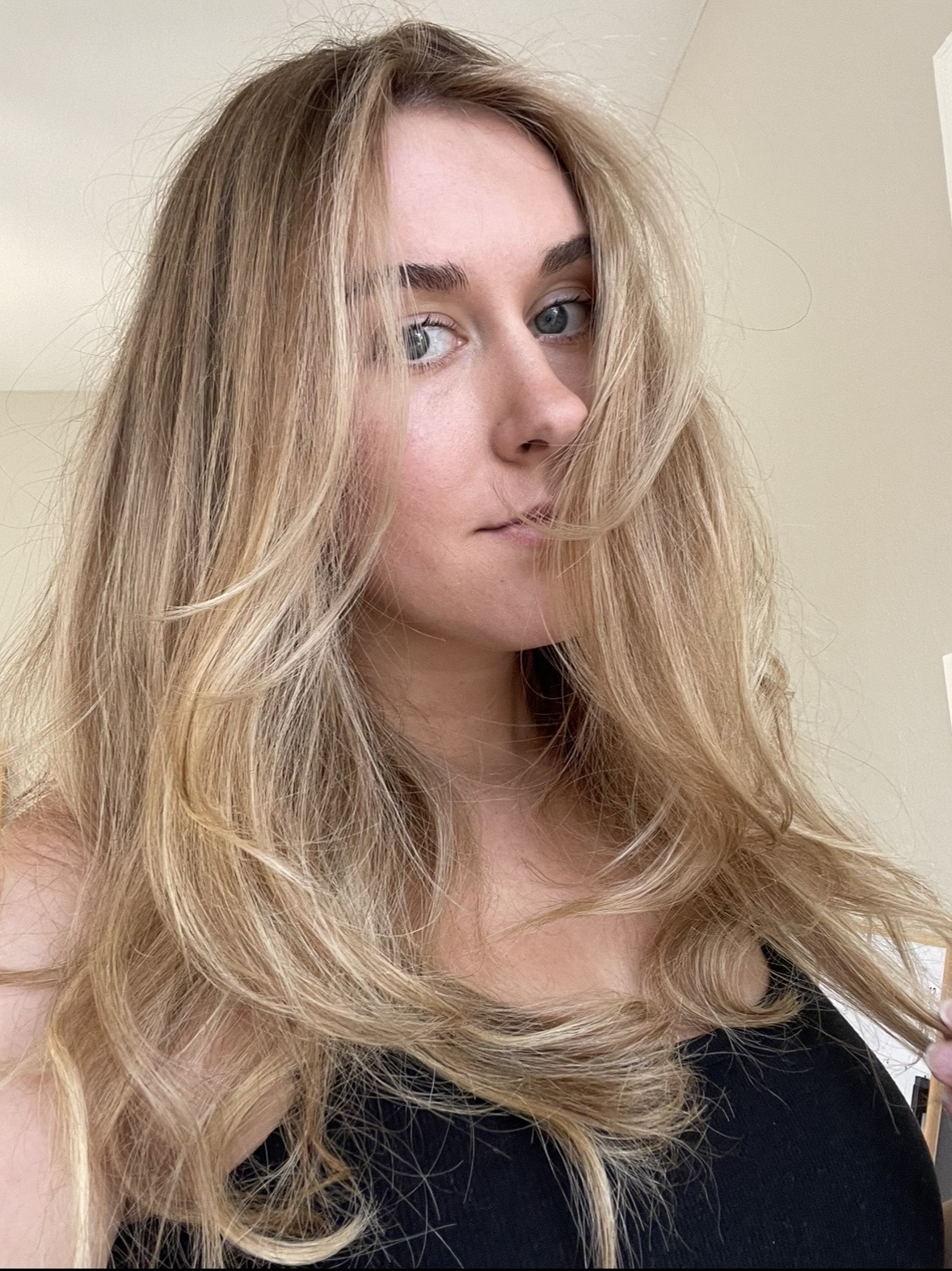 Kaitlyn McLintock with shiny, blown out hair.