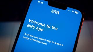 The National Health Service (NHS) application is seen on a mobile device in this photo illustration on 13 July, 2023 in Warsaw, Poland.