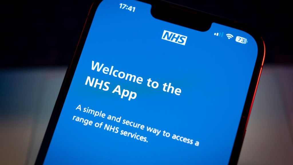 The National Health Service (NHS) application is seen on a mobile device in this photo illustration on 13 July, 2023 in Warsaw, Poland.