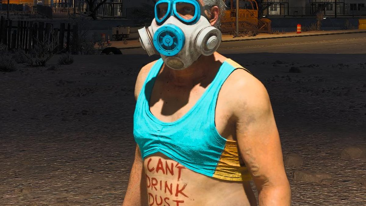 An old man in a gas mask with CAN&#039;T DRINK DUST written on his exposed stomach